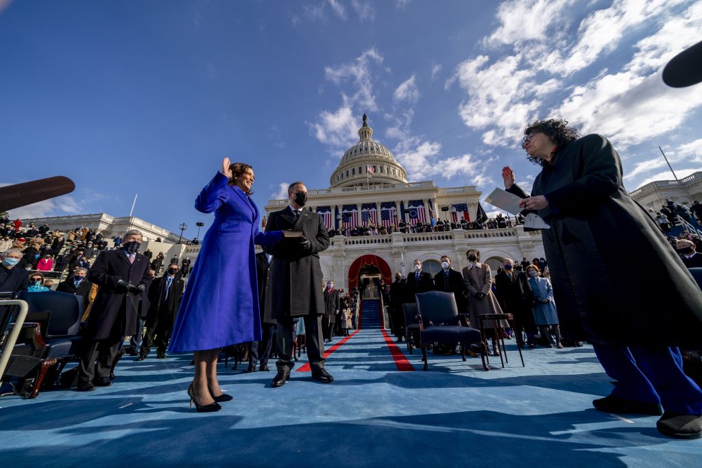 Kamala Harris is sworn in as Vice President by Supreme Court Justice Sonia Sotomayor as her husband Doug Emhoff holds the Bible during the 59th Presidential Inauguration at the U.S. Capitol in Washington, Wednesday, Jan. 20, 2021. (AP Photo/Andrew Harnik, Pool)