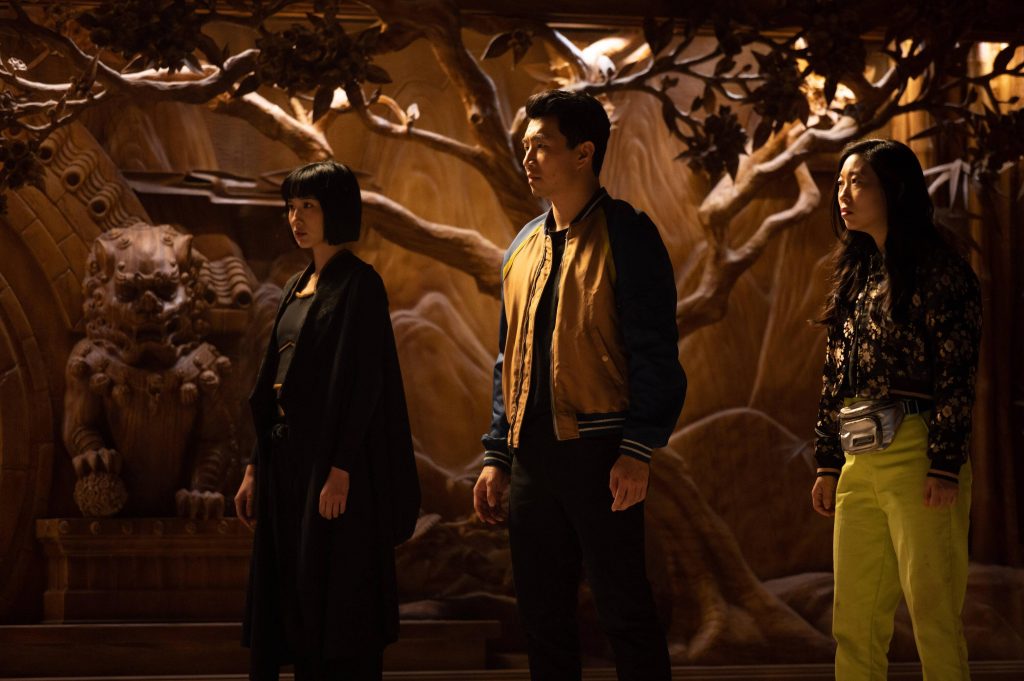 (L-R): Xialing (Meng’er Zhang), Shang-Chi (Simu Liu) and Katy (Awkwafina) in Marvel Studios' SHANG-CHI AND THE LEGEND OF THE TEN RINGS. Photo by Jasin Boland. ©Marvel Studios 2021. All Rights Reserved.