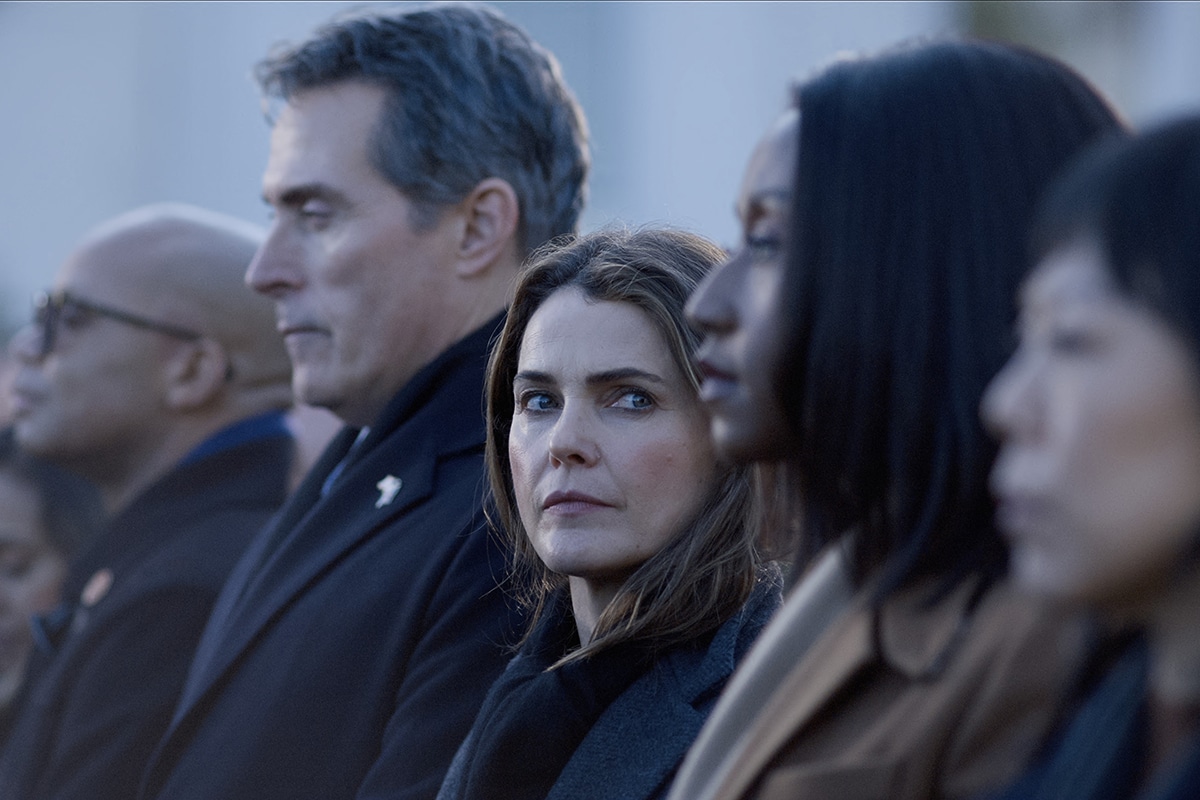 The Diplomat. (L to R) Rufus Sewell as Hal Wyler, Keri Russell as Kate Wyler, Nana Mensah as Billie Appiah, Ali Ahn as Eidra Park in episode 306 of The Diplomat. Cr. Courtesy of Netflix © 2025